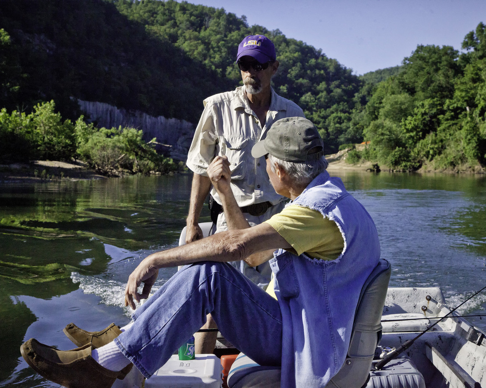 Two anglers on a fishing boat