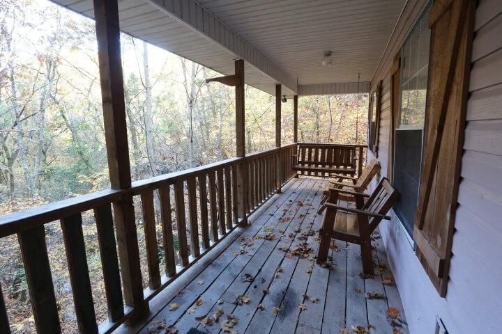 Porch area with benches and porch swing