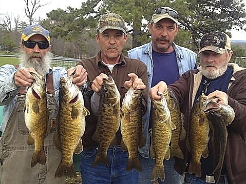 Photo of four anglers & their catch