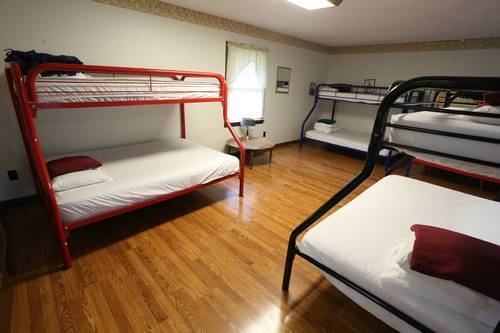 Large bedroom area with multiple bunk beds
