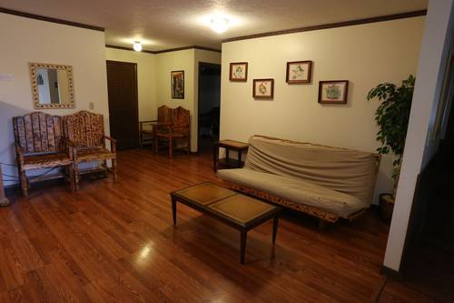 Another living area with couch and chairs