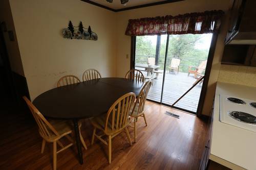 Dining table with view of back porch